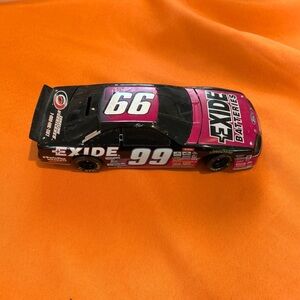1995 Jeff Burton Racing Champions Exide Diecast Car# 99 Thunderbird 1/18 Scale.